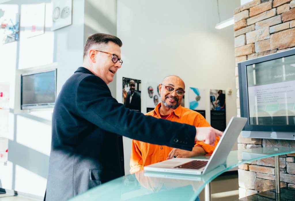 The “Right Culture” to Have in a Crisis: Two men collaborating at work